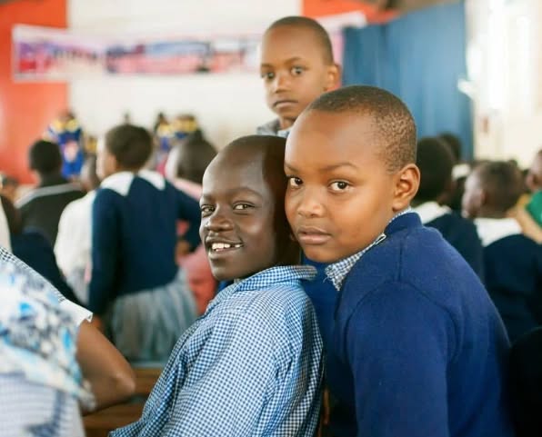 Children learning together in a supported classroom