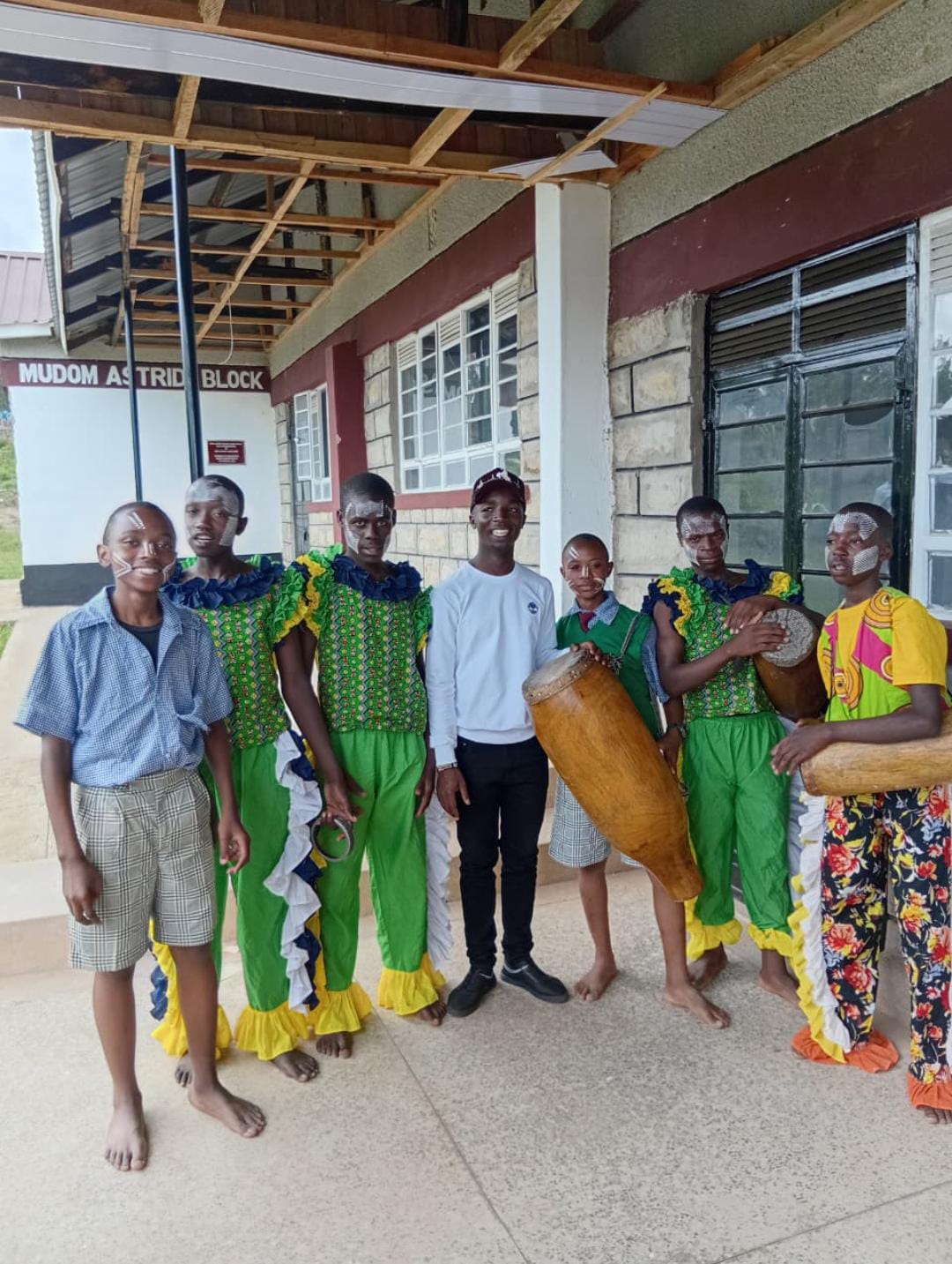 Children performing for their community